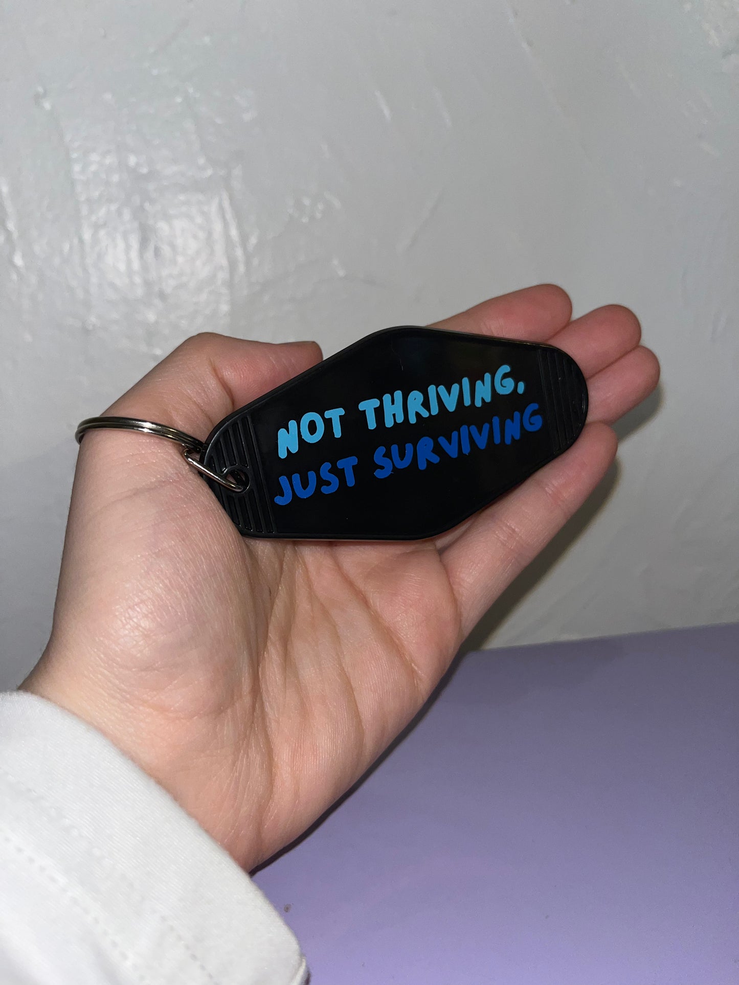 Not Thriving Motel Keychain