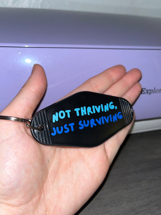 Not Thriving Motel Keychain